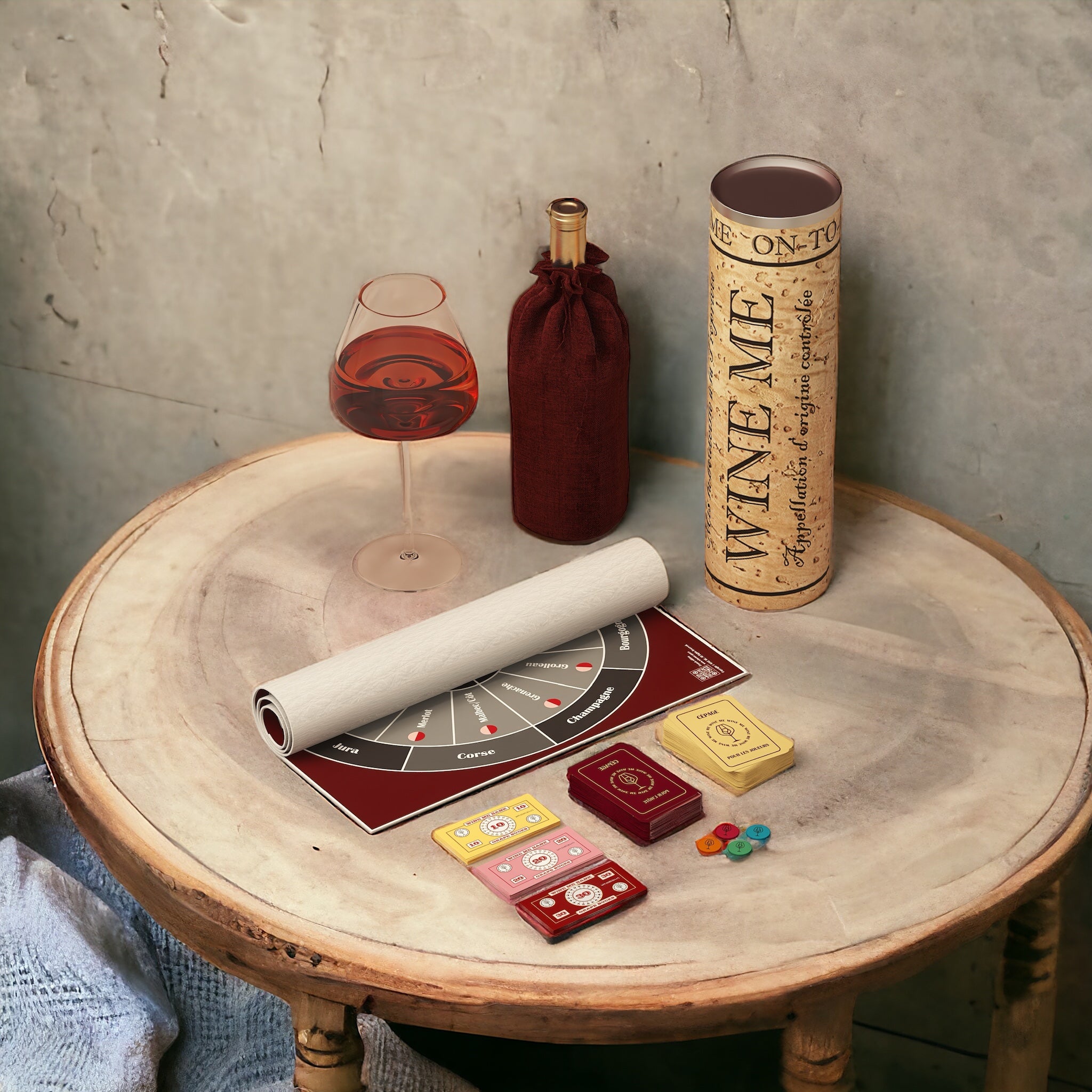 Jeu de société WINE ME Casino du Vin avec tapis, cartes, jetons et accessoires de dégustation.