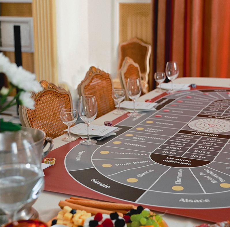 Table de dégustation du Casino du Vin WINE ME, conçue pour une expérience œnologique interactive et pédagogique.
